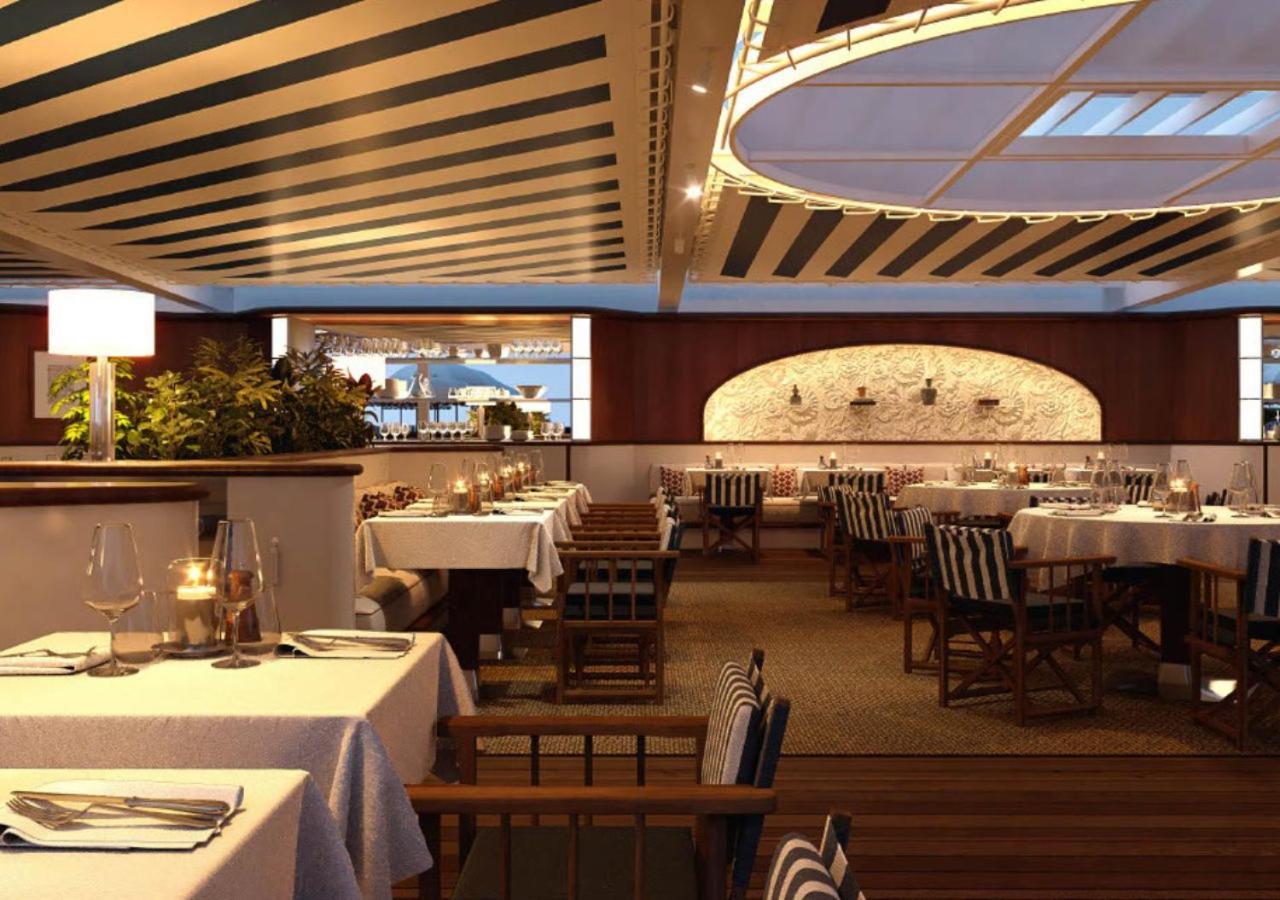 โรงแรมบาริแยร์ เลอ มาเจสติค คานส์ ภายนอก รูปภาพ Interior of the restaurant